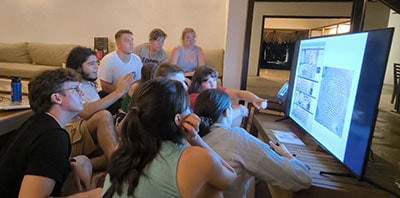 Students learning about coral reef conservation through Reef Check educational programs.